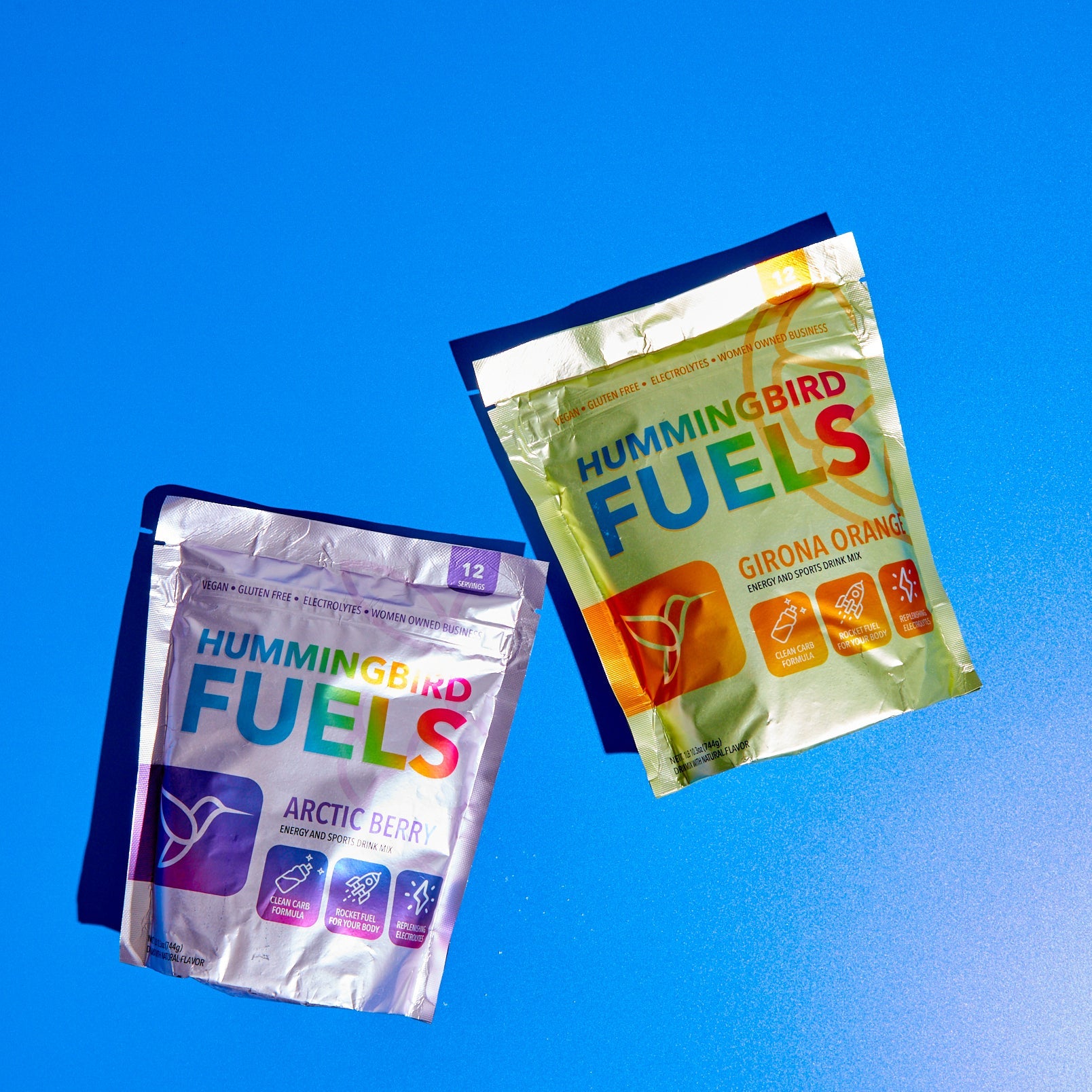 Two packages of Hummingbird Fuels against a blue sky background